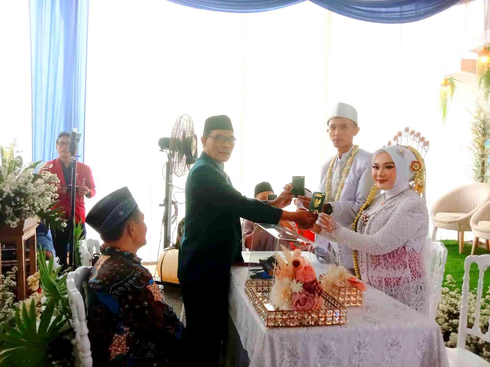 Ozzi_Maulana_dan_Septiyawati_11zon.jpeg